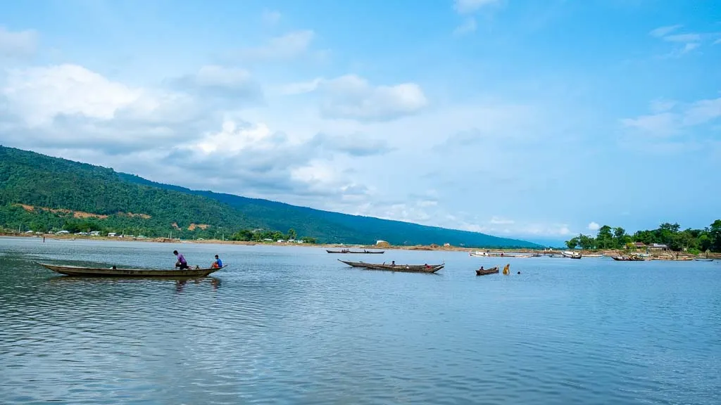 A local fisherman looks for a fishing opportunity at Piyain river in Sylhet