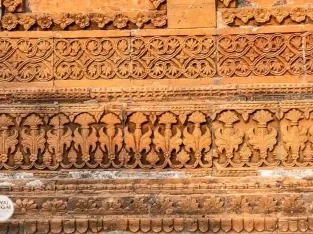 Beautiful ornamented brick wall of Puthia land lords palace