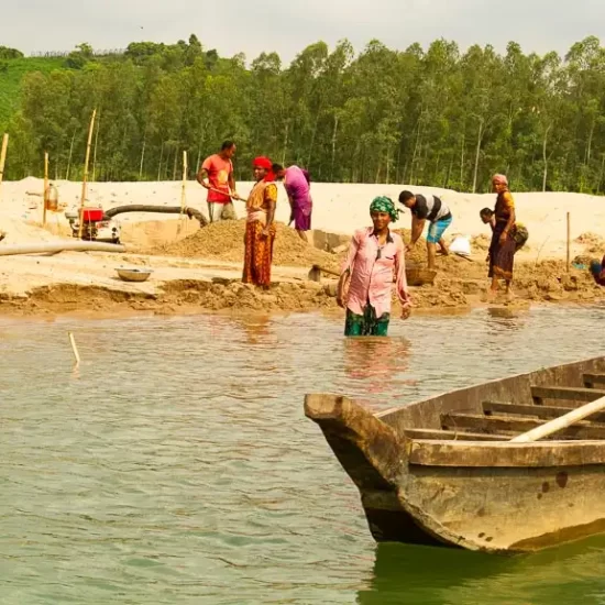 Collecting stone and coals from Someshwari River