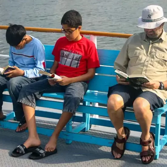 field research trip on a river near Dhaka with schoold kids