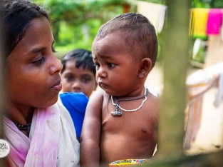 A tea worker child mother with her baby in Sreemangal