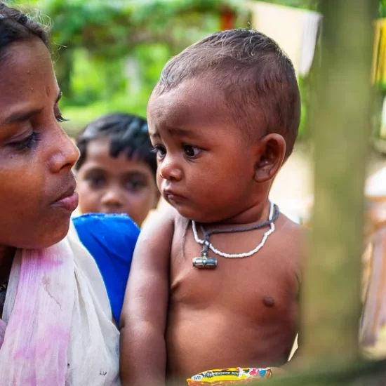 A tea worker child mother with her baby in Sreemangal