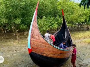 Beautiful moon shape wooden fishing boat in coxs bazar