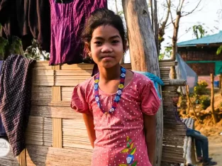 Tripura tribal kid on her yard in Bandarban hill tracts