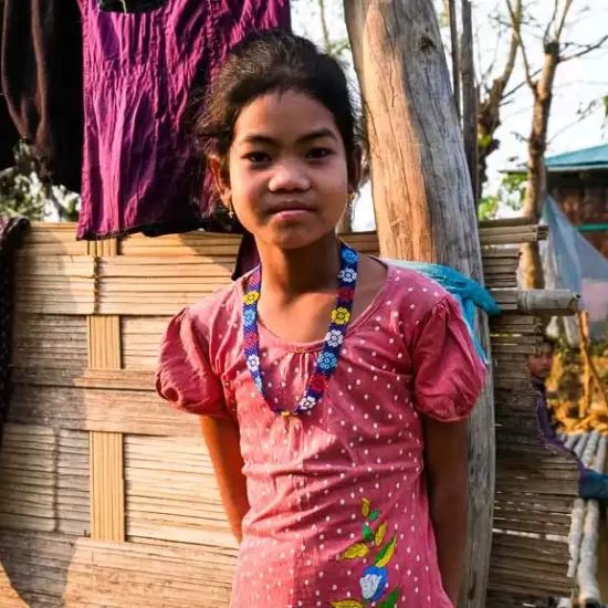 Tripura tribal kid on her yard in Bandarban hill tracts