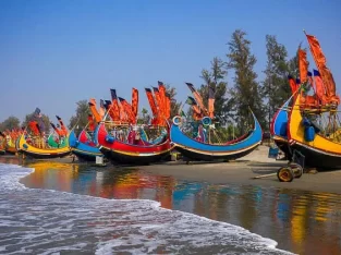 Vibrant colourful wooden fishing boat on the sore of Bay of bengal in coxs Bazar