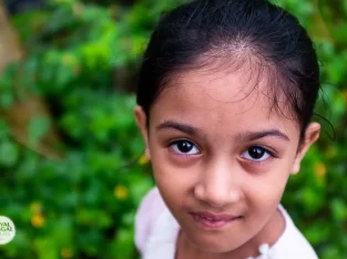 beautiful innocent girls portrait in a fisherman village near coxs bazar sea beach