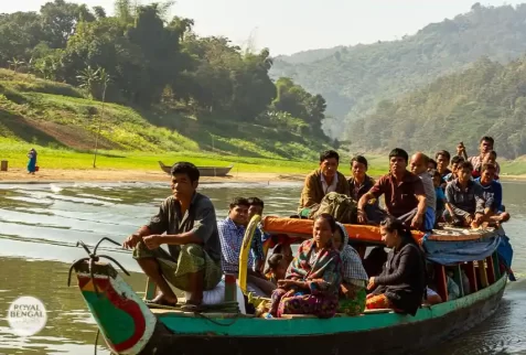 tribal people travel a long distance by boat in chittagong