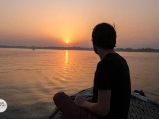 enjoying the sunset from a boat on meghna river near sonargaon