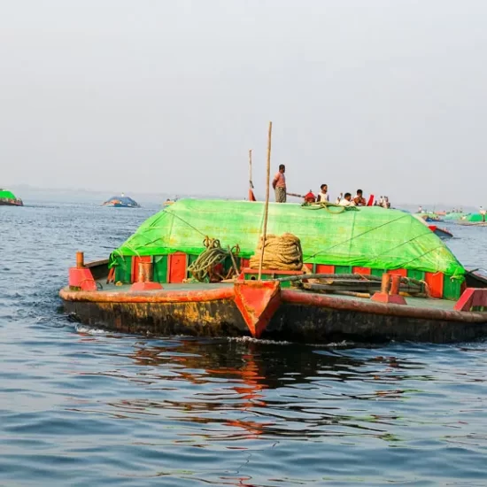 sand carrying boat looks like a submarine on meghna river in Bangladesh